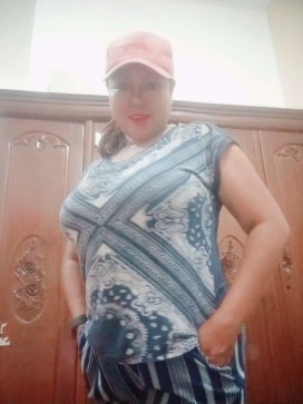 Nur Liza, 51, Indonesia