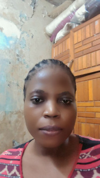 Lusia, 35, Kenya