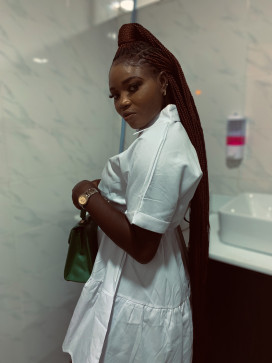 Precious, 28, Nigeria