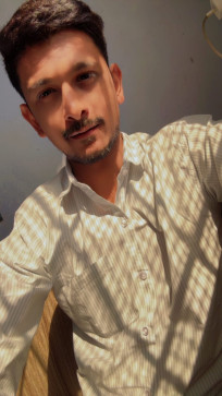 Michael Het, 30, India