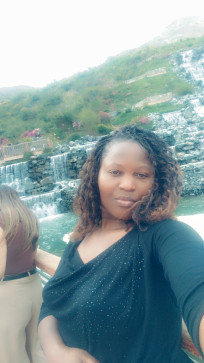 Lynnet, 34, Uganda